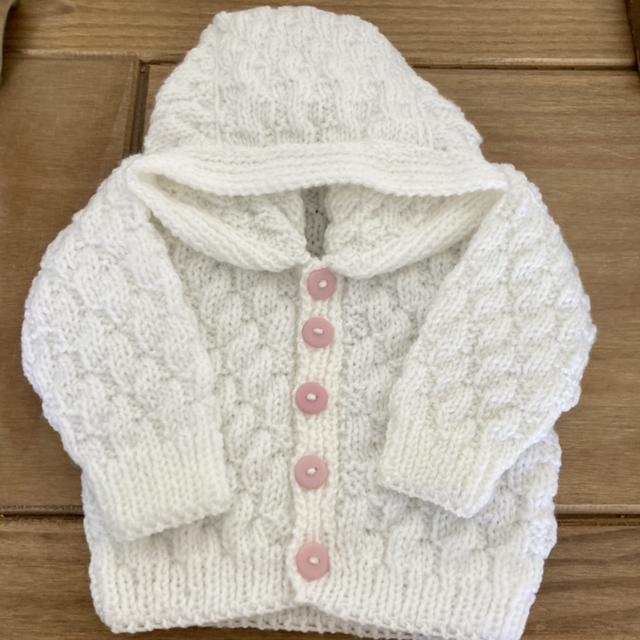 A knitted hoody sold by Made with Love by Sandra S